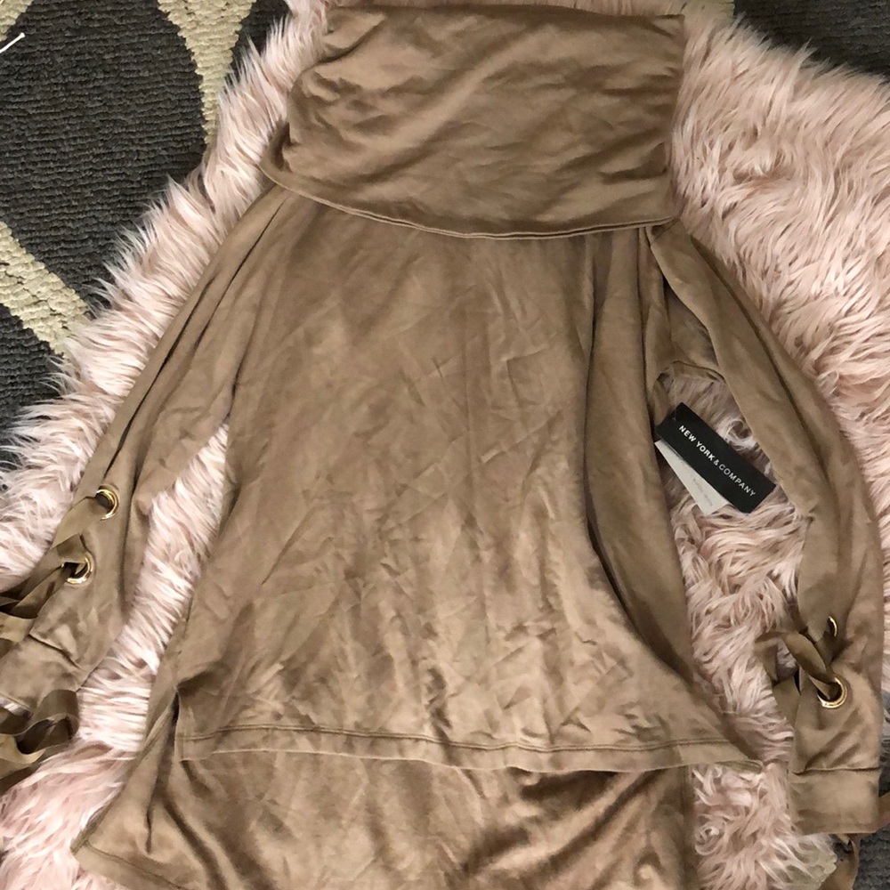 Light tan colored long sleeve blouse